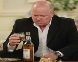 Steve McFadden consuming alcohol